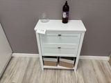 a white cabinet with a bottle of wine on top of it