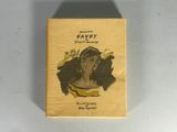 a small box with a drawing of a woman on it