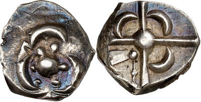 an image of a silver coin with a cross on it