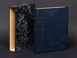 an image of a book with a cover that has a design on it