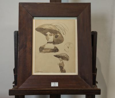 une photo d'une photo représentant une femme portant un chapeau