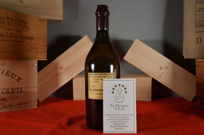 a bottle of wine that is sitting on a table