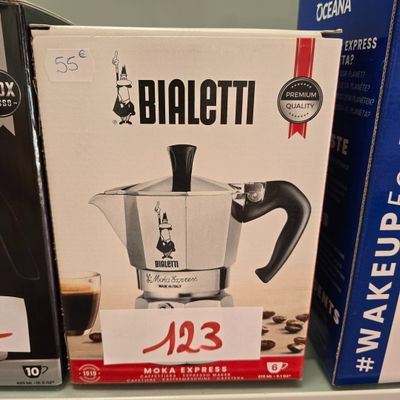 a box of coffee maker on a shelf in a store