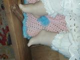a doll that is laying down on the floor