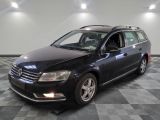 the volkswagen passat is parked on a checkered tile floor