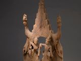 an image of a sculpture of a man and woman in a crown