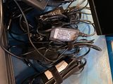 a lot of cords that are connected to a laptop