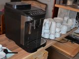 a coffee machine sitting on top of a kitchen counter