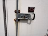 a close up of a metal latch on a door