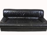 black leather sofa on a white background with a white background