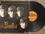 an old record with a picture of the beatles on it
