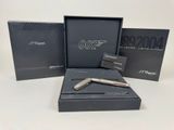 a boxed box with a pen and a knife in it