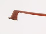 a close up view of a wooden handle on a pair of glasses