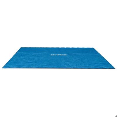 a blue mat with a white logo on it on a white background