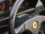 a close up of a steering wheel and dashboard of a car