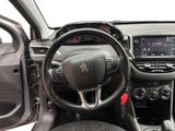 the interior of a car with a steering wheel and dashboard controls