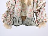 an image of a shirt hanging on a hanger