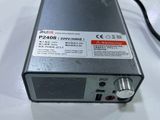 the power supply is sitting on the table ready to be used