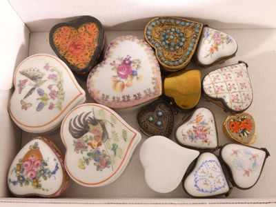a box filled with heart shaped cookies and decorated cookies