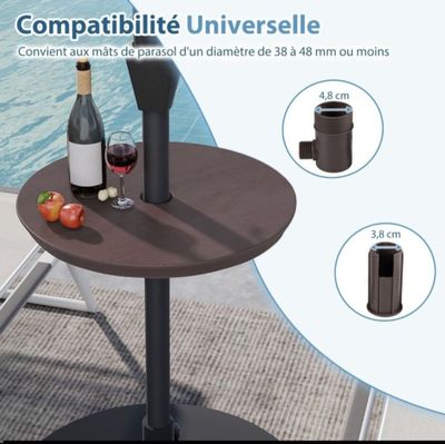 a table with a bottle of wine and a glass of wine on it