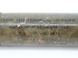a close up of a metal container with a label on it