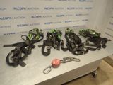 five motorbikes lined up on a table with a keychain