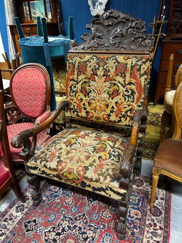 Deux fauteuils néo Renaissance garnis de tapisserie au point, amo...