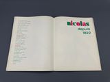 a white book with a green and red logo on it