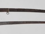 two knives are shown on a white surface with a white background