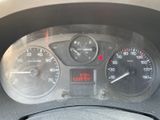a close up of a car dashboard with a speedometer