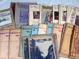 a lot of books that are on a bed