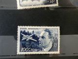four different stamps are on display in a display case
