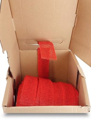 a box with a roll of red rope in it