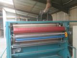 a machine that is working on a piece of paper