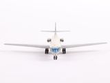 a small airplane that is sitting on a white surface