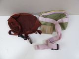 two bags that are sitting on a white table