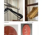 four pictures of clothes hanging on a rack in a room