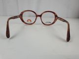 an image of a pair of glasses sitting on a table
