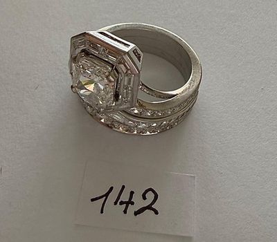 a ring that is sitting on top of a piece of paper