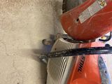 an image of a chainsaw with a blade attached to it