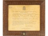 un vieux document encadré de bois sur fond blanc