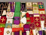 many different types of cloths laid out on the floor