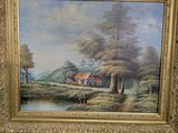 une image d'un tableau sur le mur d'une pièce