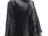 black lace shawl on a mannequin mannequin mannequin mannequin mannequin mannequin mannequin mannequin manne