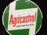 un panneau vert et blanc sur lequel est inscrit « Agricostol »