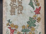 an old book with a floral design on it