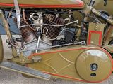 a close up of a motorcycle with a red stripe on the side