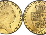 an image of a gold sovereign coin with a crown on it