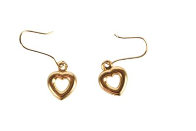 a pair of gold heart earrings on a white background