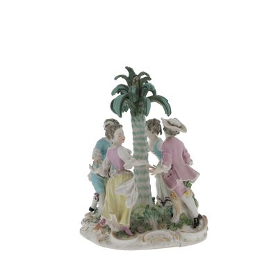 a figurine of a group of people on a beach